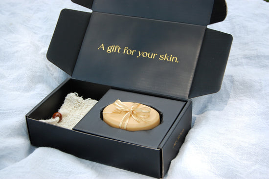 Cute shipping box. Trending packaging with goat milk bar soap. A gift for your skin.